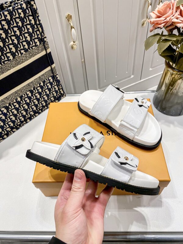 LV 53.66$ code 449-7388-R - Image 4