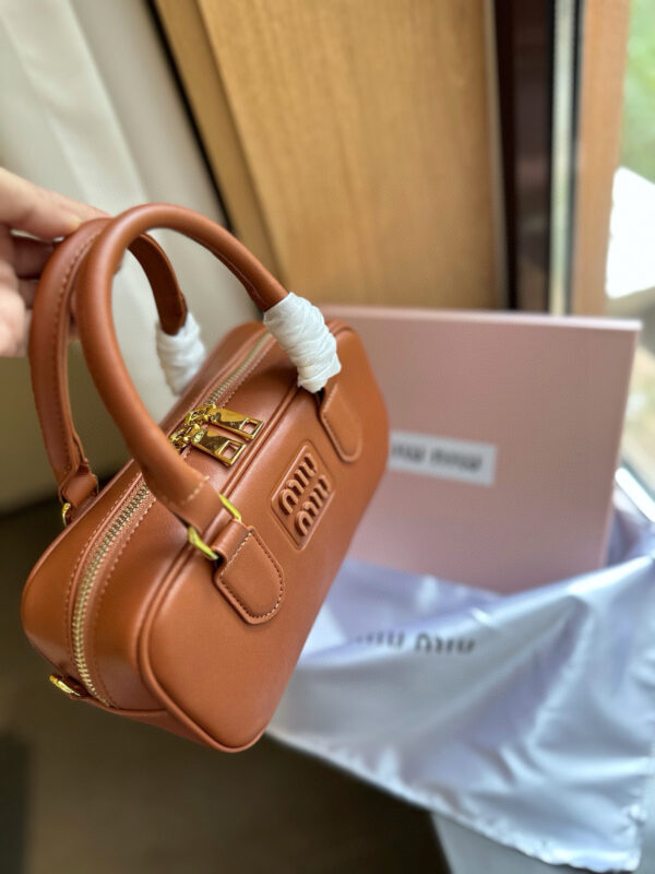 miumiu 49.29$ code 306-7212-R - Image 3